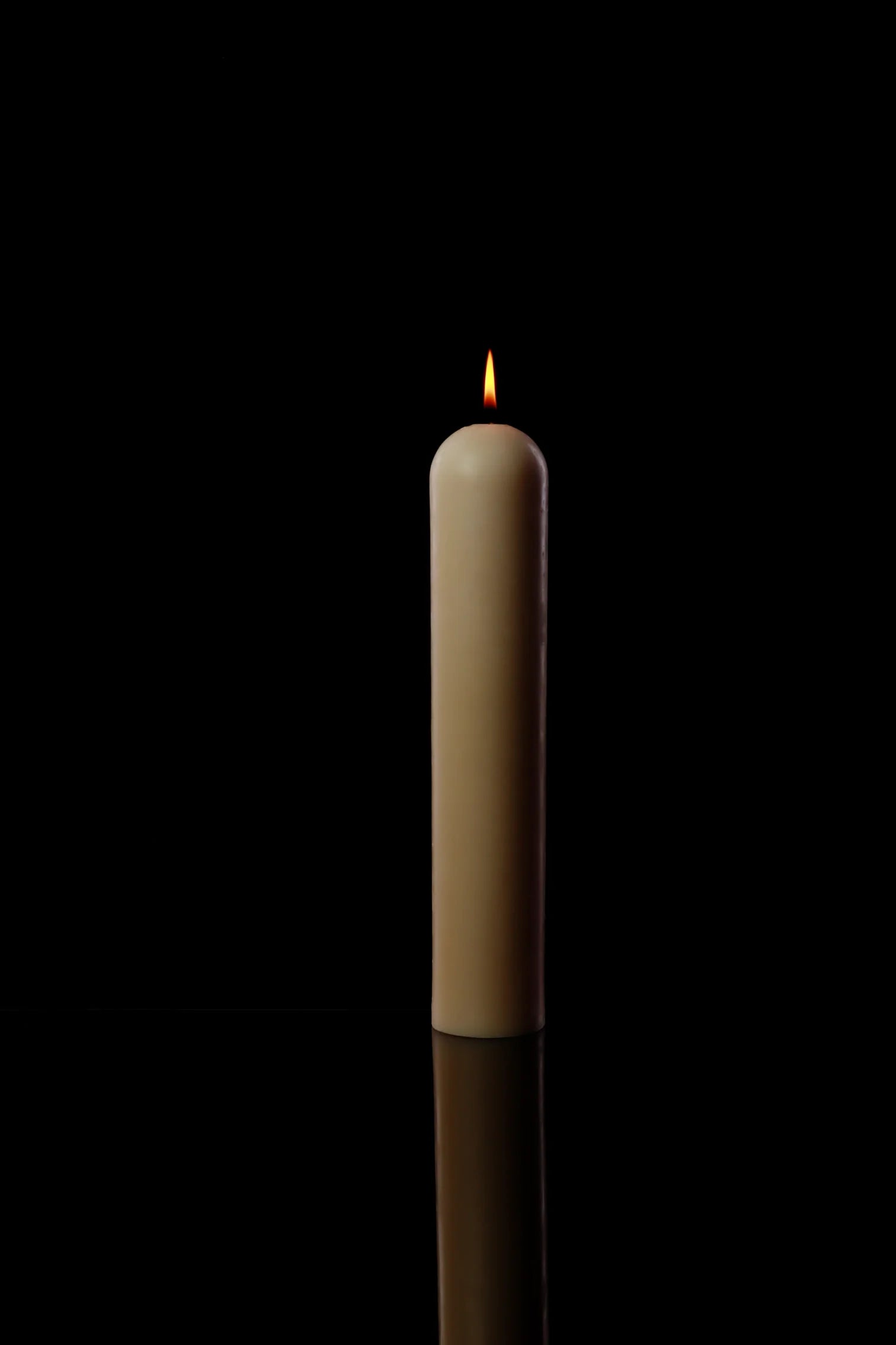 Our Stand-Alone Large Candle is a substantial piece that can anchor any room with its presence.