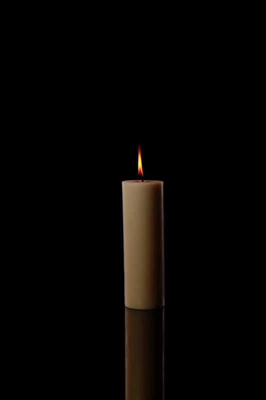 The Pillar Medium Candle's size ensures it fits on any shelf or table, offering hours of steady, beautiful candlelight.