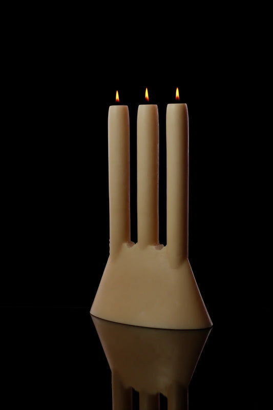 The Trident Candle stands out with its XL three-pronged spear candle resembling Poseidon, the god of the seas, weapon.